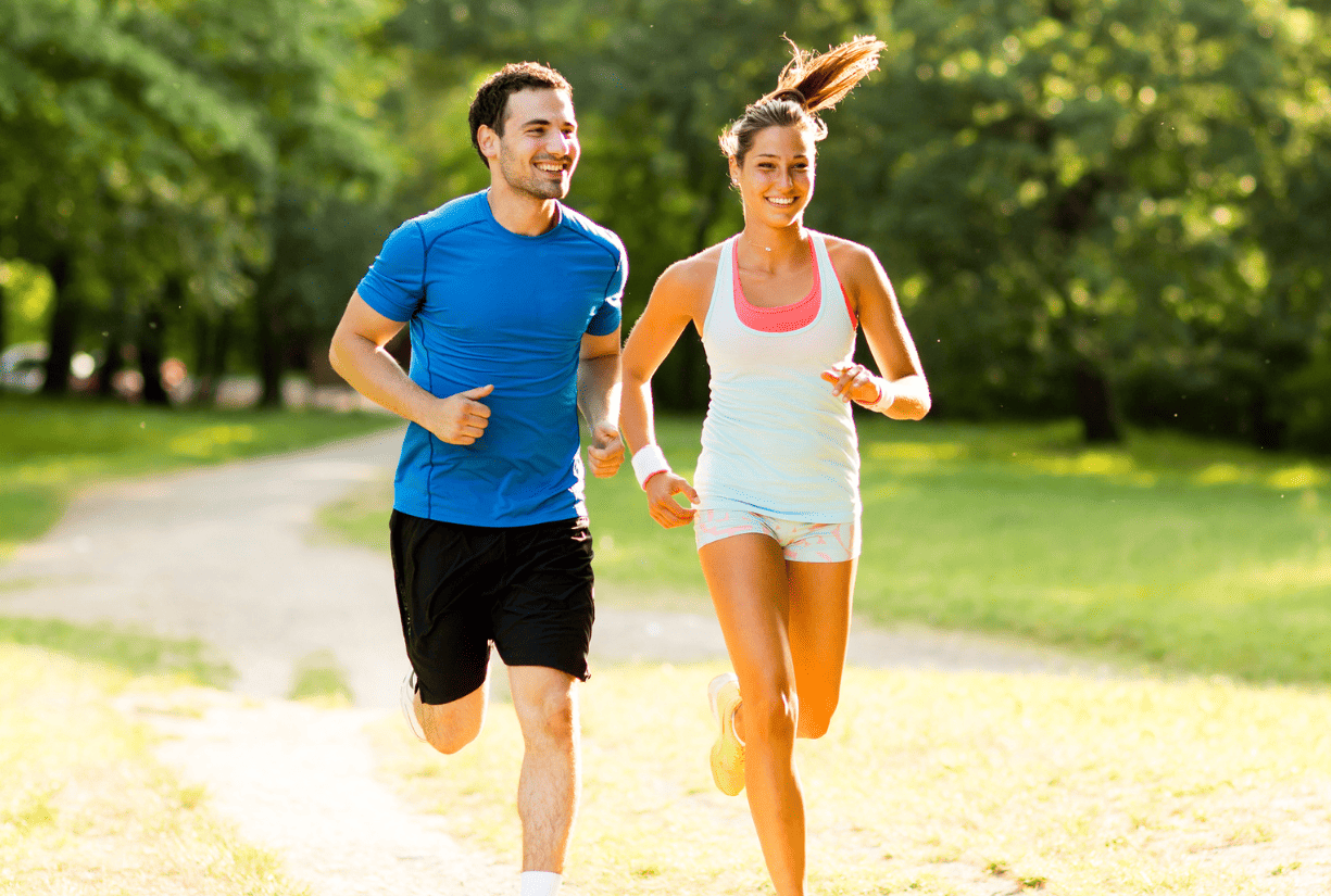 young couple jogging outside
